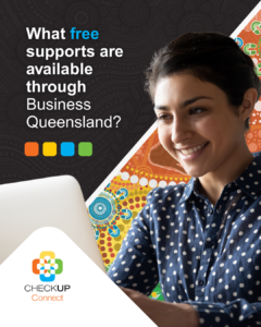 young lady at computer, First Nations Art behind her with word to the left: What free supports are available through Business Queensland?